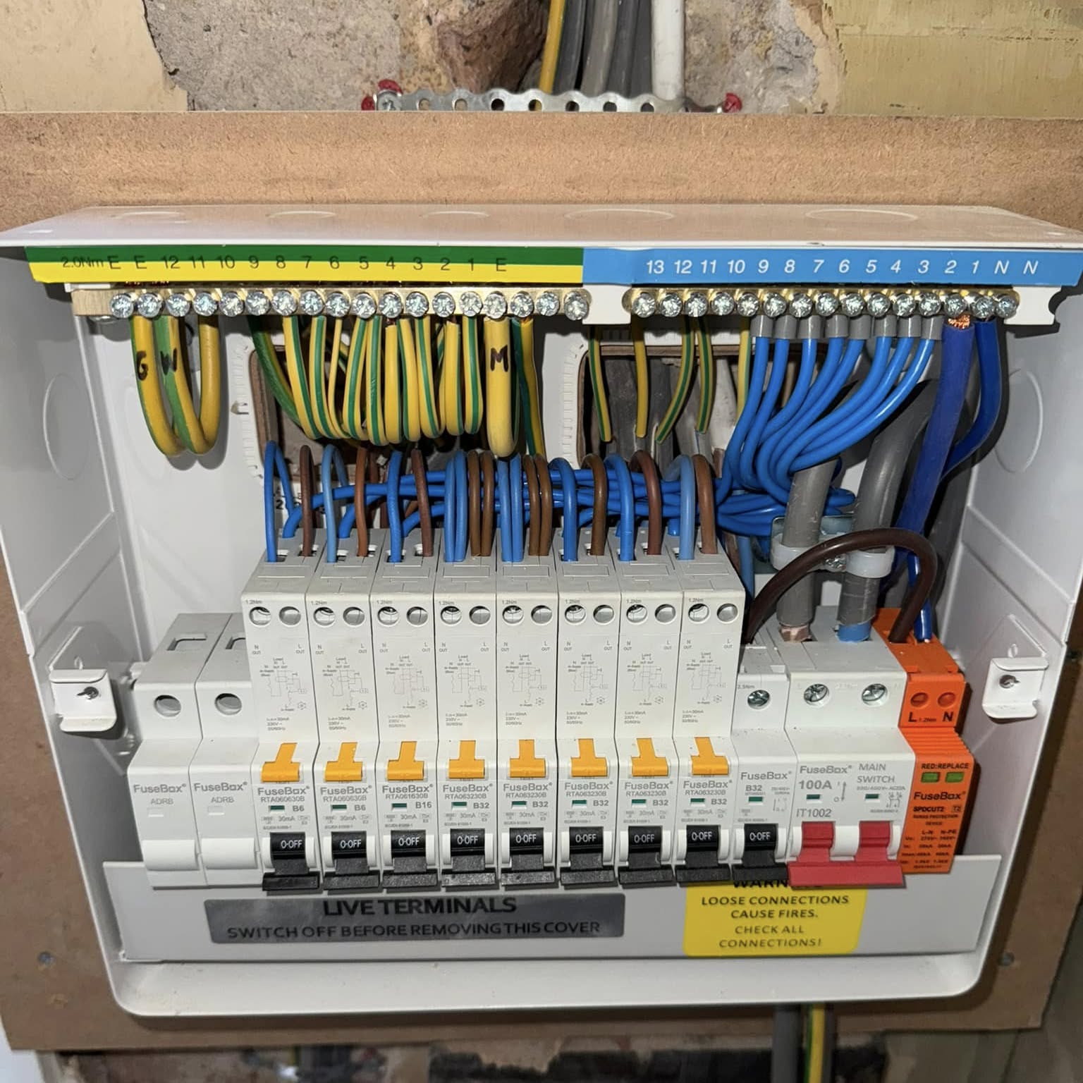 Inside a new consumer unit — combed, numbered, labelled